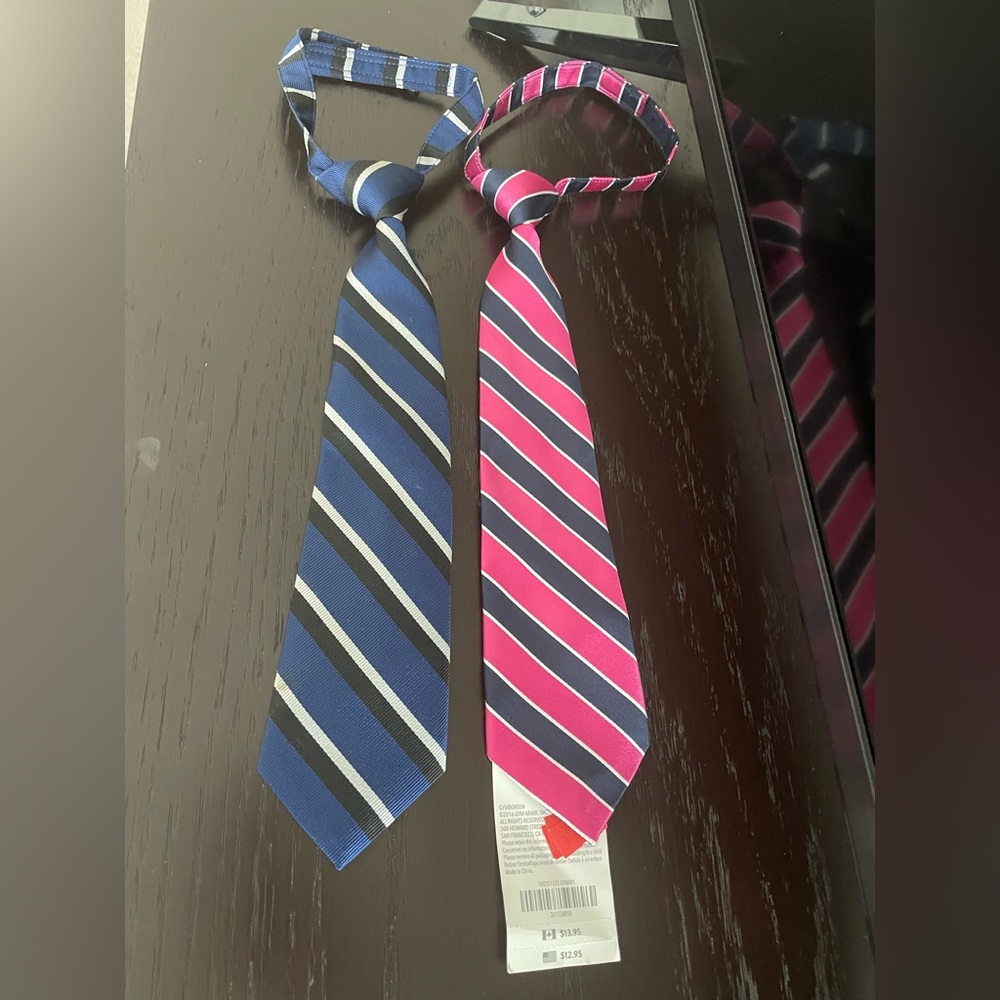 2 boys ties. 2T-5T ties from gymboree. One new